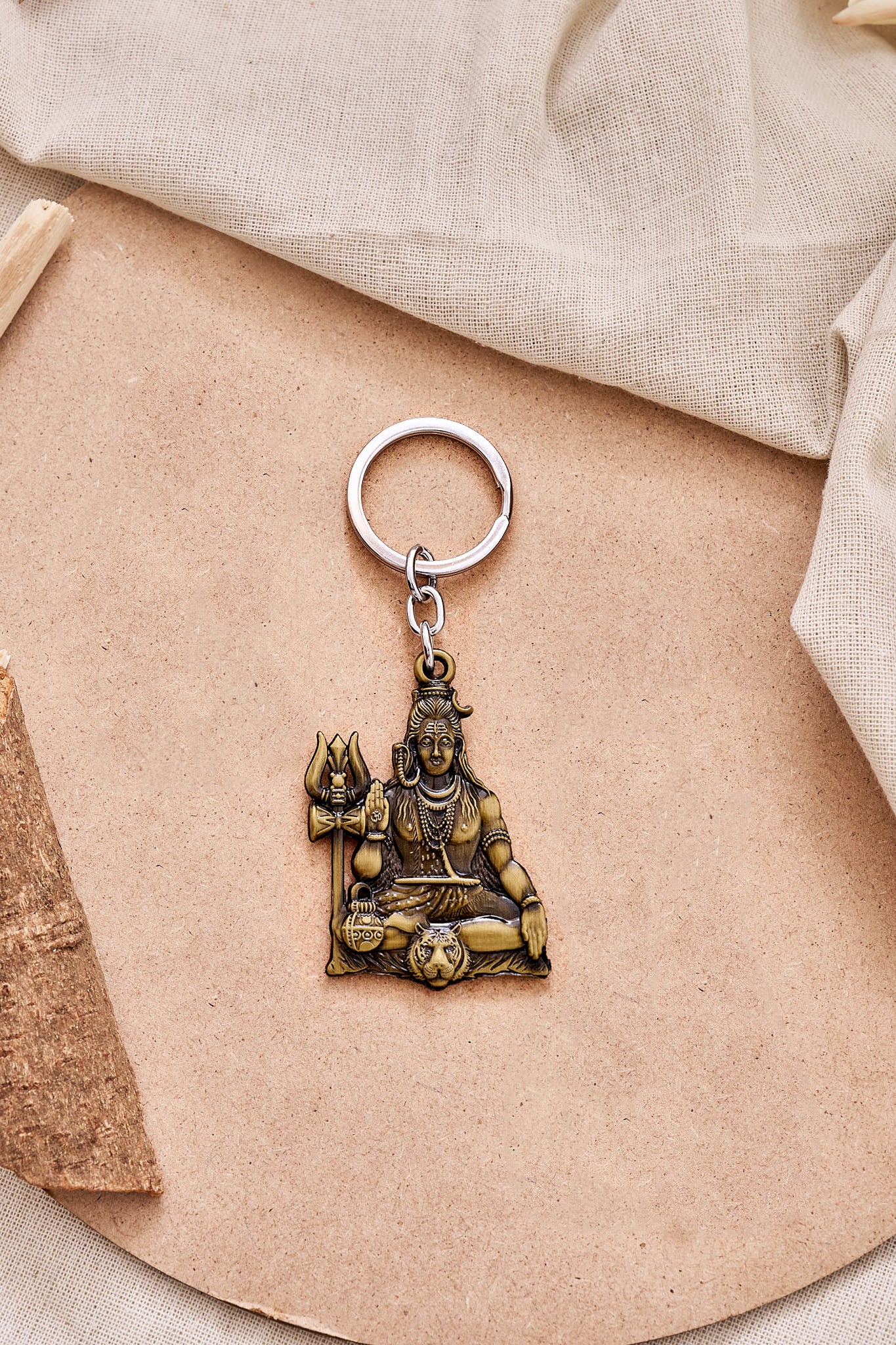 Antique gold Lord Shiva Mahadev keychain with Trishul design