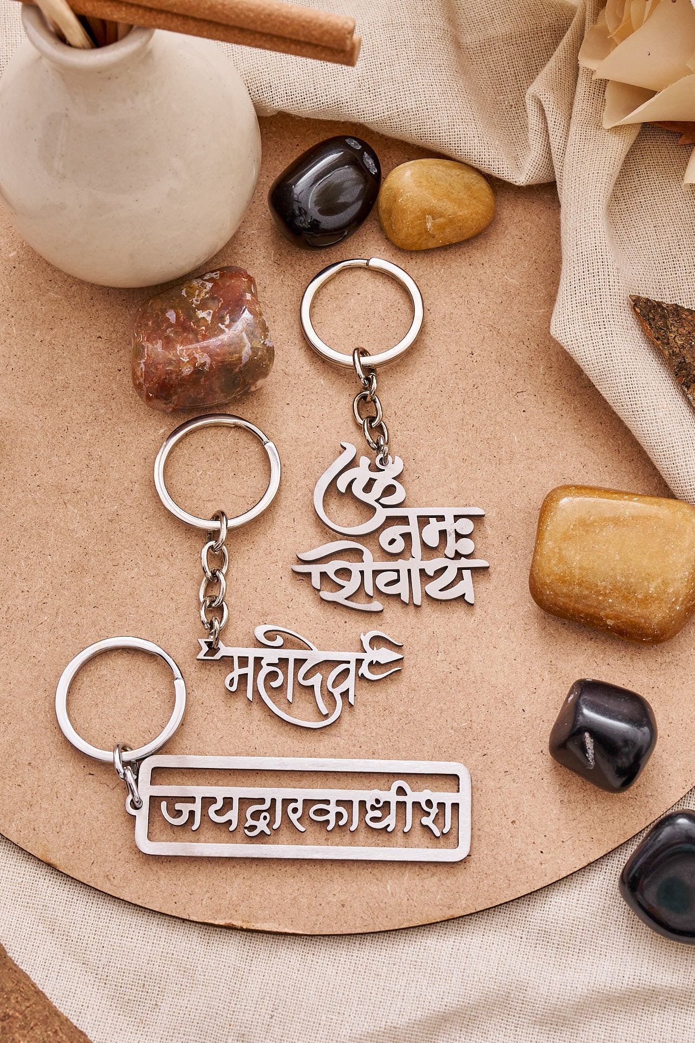 Hindu mantra metal keychain featuring Om Namah Shivaya and Mahadev designs