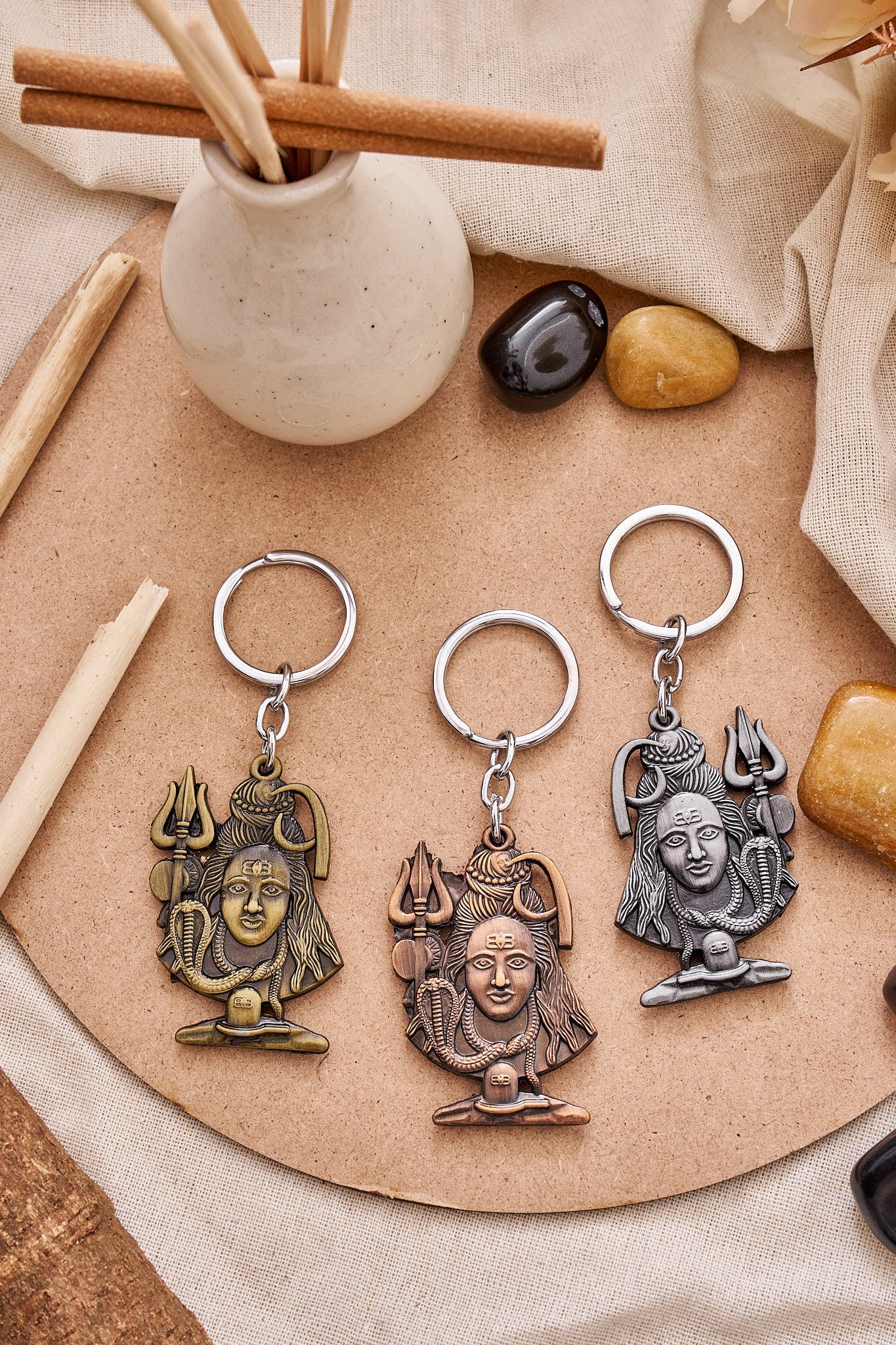 Lord Shiva face metal keychain with Trishul and intricate detailing for spiritual gifting